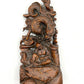 The wood carving of Arhat subduing the dragon